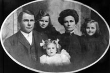 Lois Dondanville Kirby , husband Dr. John,	twins Louise and Jeanne, and baby Evelyn, Cedar Vale,Kansas, 1904