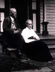 Wallace and Elizabeth on the front steps of their home,Serena Township, Illinois, circa 1920.