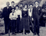 Emile Dondanville, Mary Schumacher Family, California 		1920. L to R: Emile, Edward, Theodore (front), Mary, 		Joseph, Mary Brooks Yuan, Louis John, and Fredrich.
